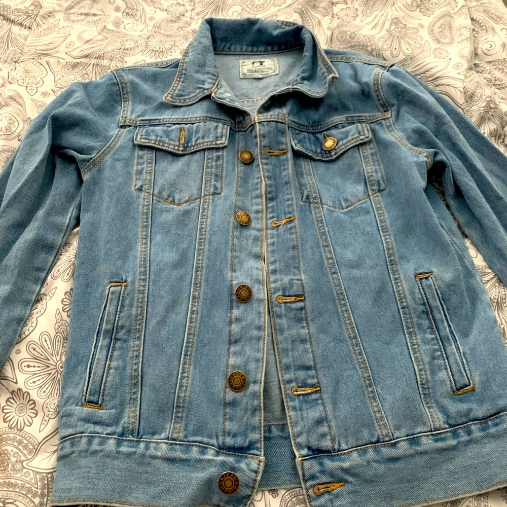 Jean jacket size large .